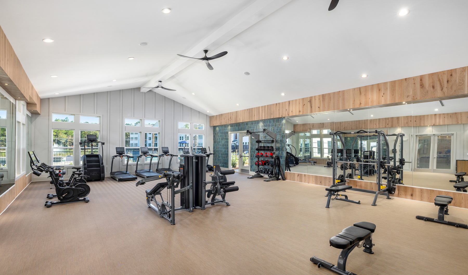 Reframe Your Every Day Fitness center with equipment and natural light